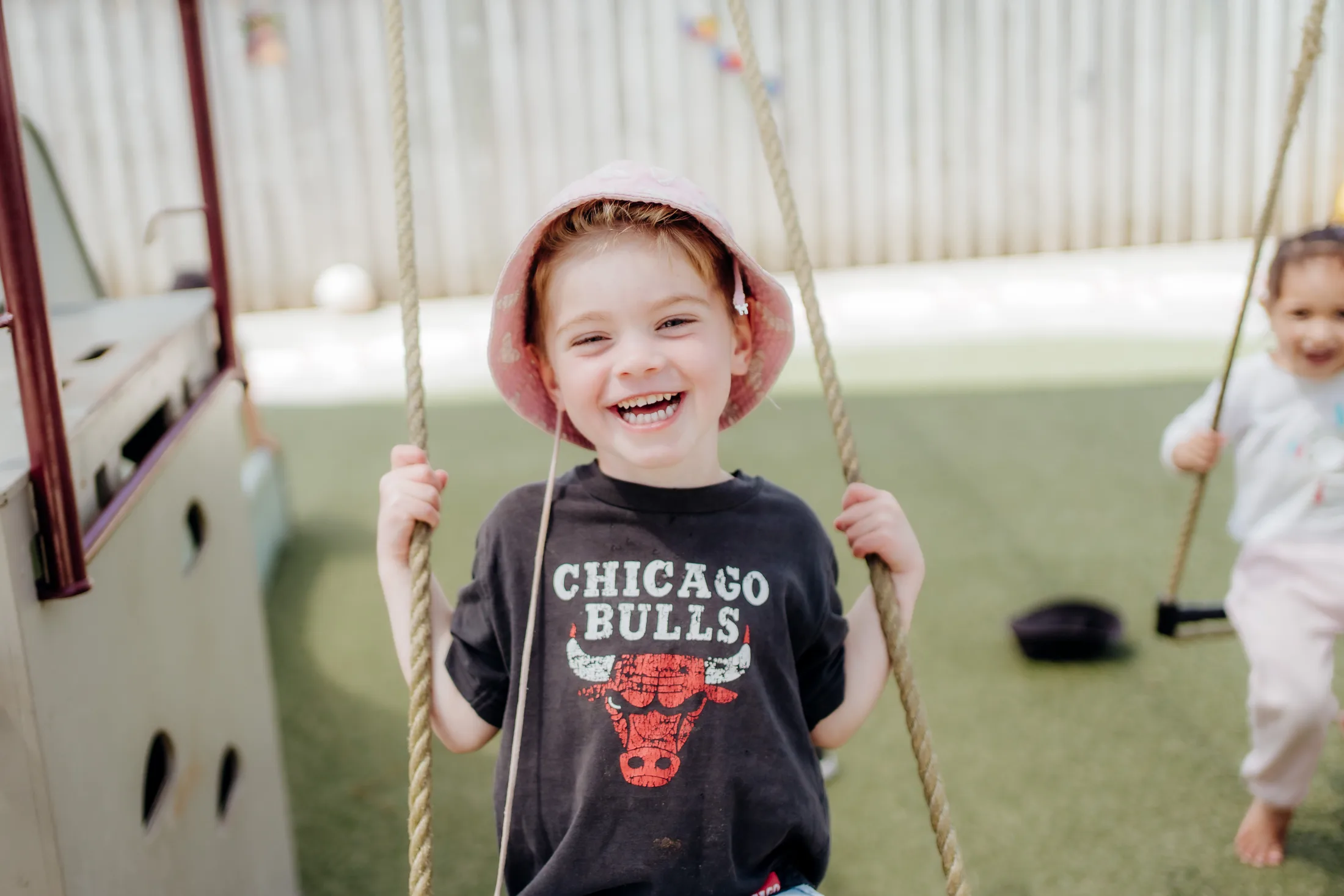 A happy child enjoying the playground