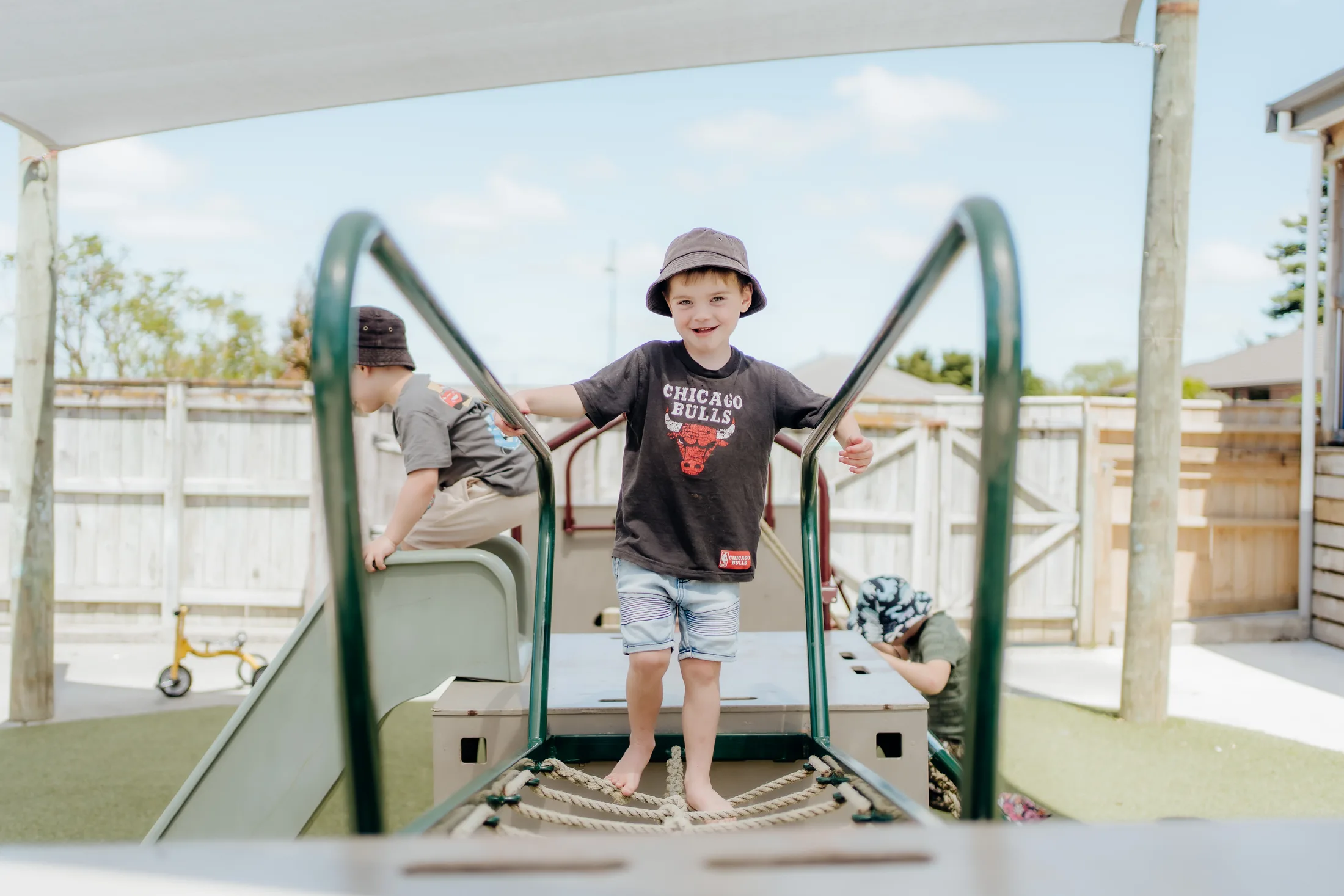 Children exploring the outdoor playground